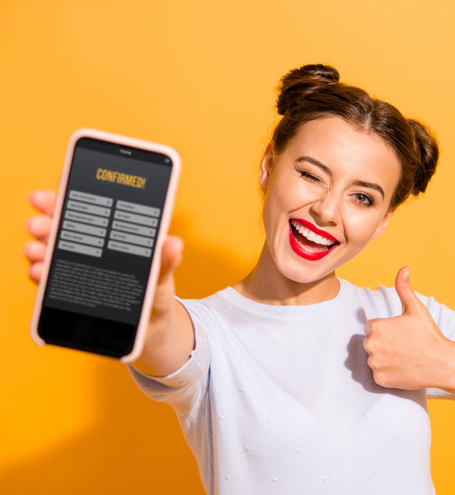 Happy women holding phone